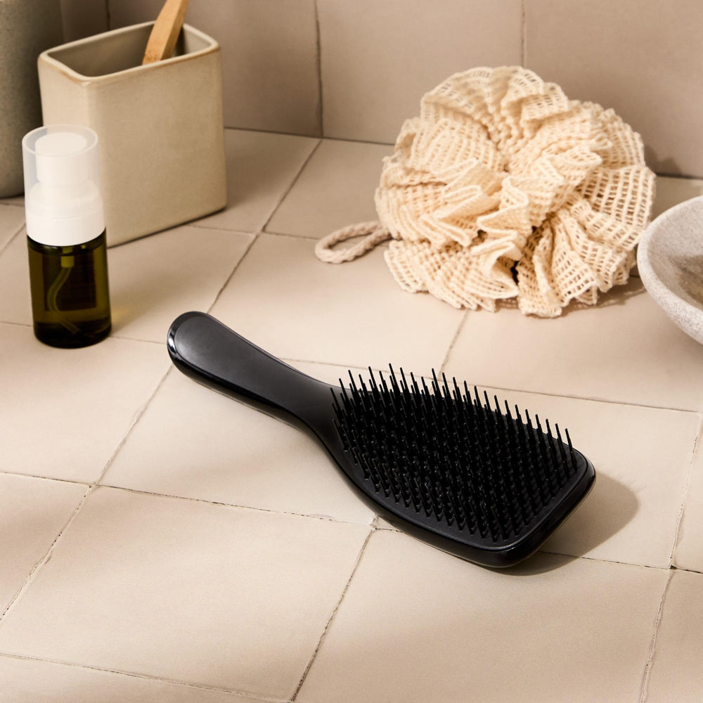 Tangle Teezer used by women and men for gentle detangling.