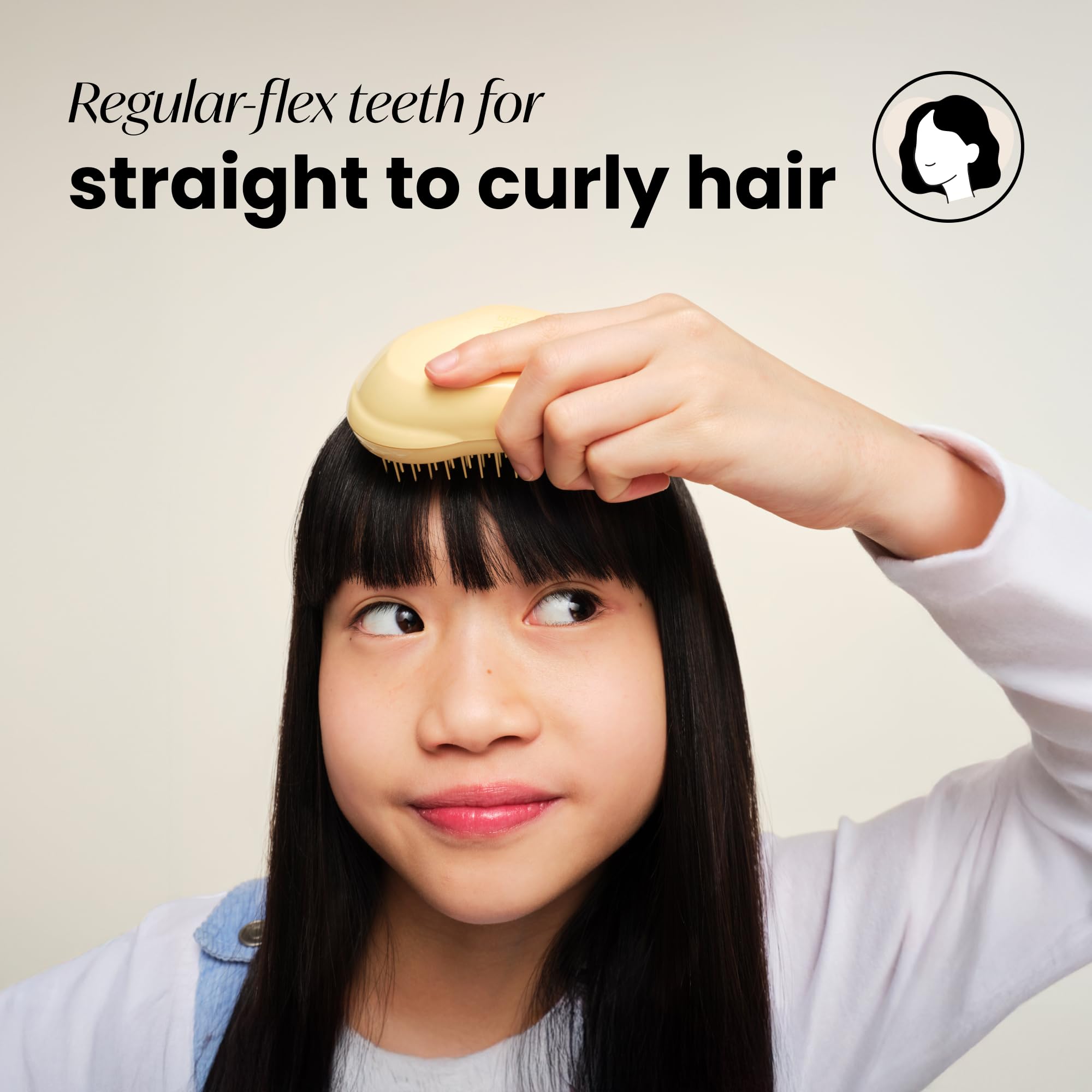 Tangle Teezer Original Detangler Buttercup Yellow teeth close-up highlighting two-tier flex teeth.