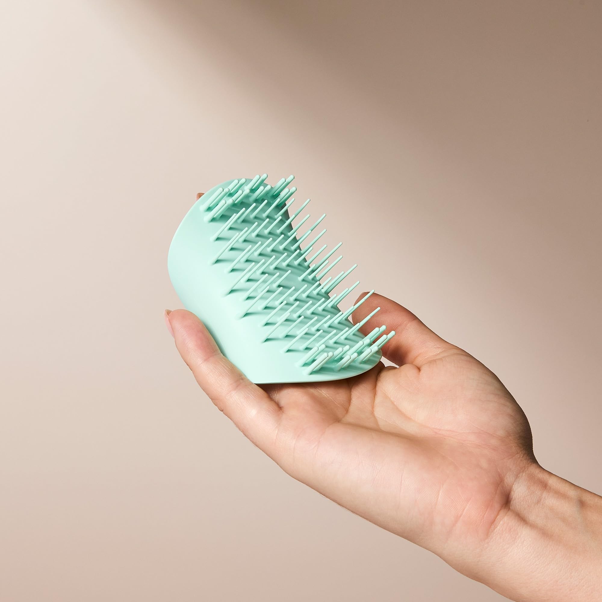 Tangle Teezer packaging transitioning to sustainable look and materials.