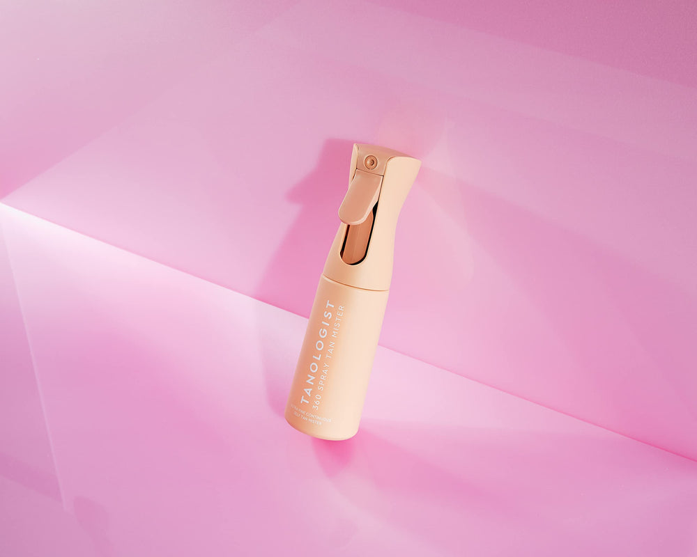 Tanologist 360 Spray Tan Mister in-use demonstrates continuous spray for efficient application