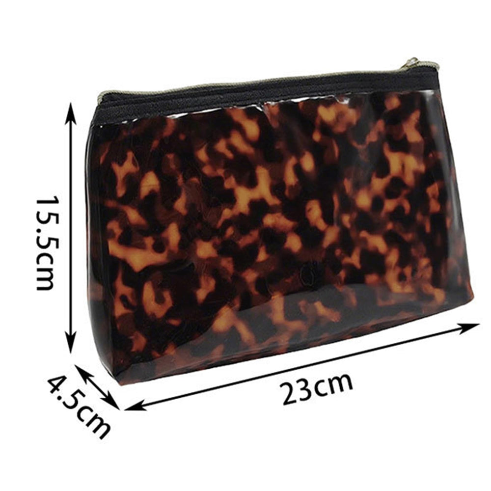 Tarvione tortoise purse in bag highlights travel-ready organization.