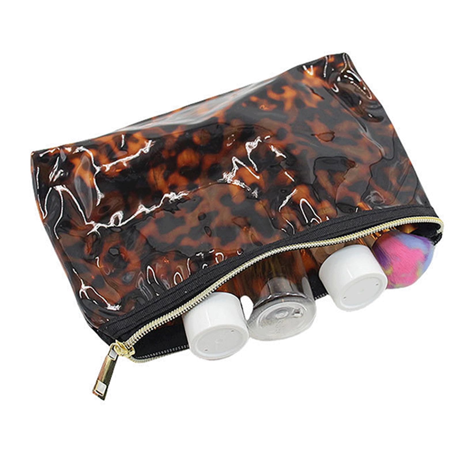 Tarvione tortoise purse in hand demonstrates portable makeup storage.
