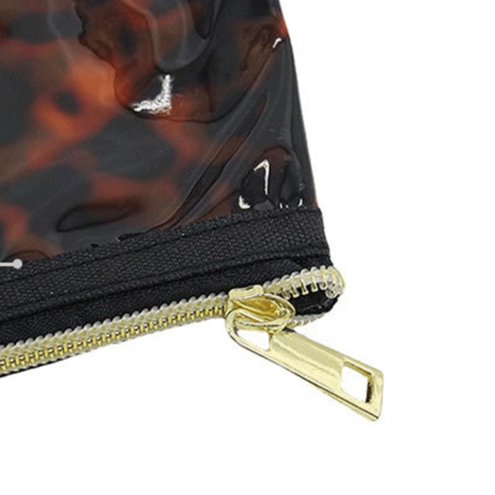Tarvione tortoise purse retro animal print adds playful gifting charm.