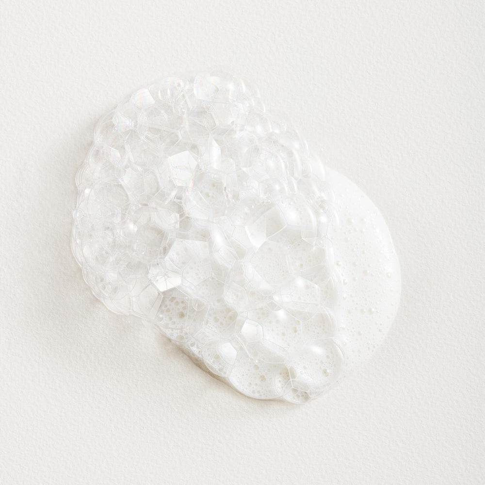 Tata Harper Superkind Softening Cleanser foam closeup highlights creamy texture that hydrates while cleansing.
