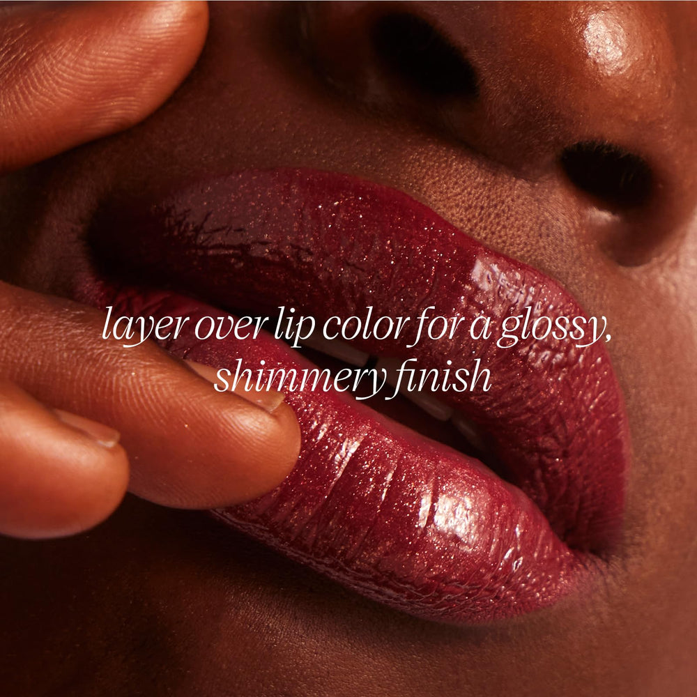 TATCHA Kissu Gold Leaf Lip Mask held in hand emphasizes premium packaging.