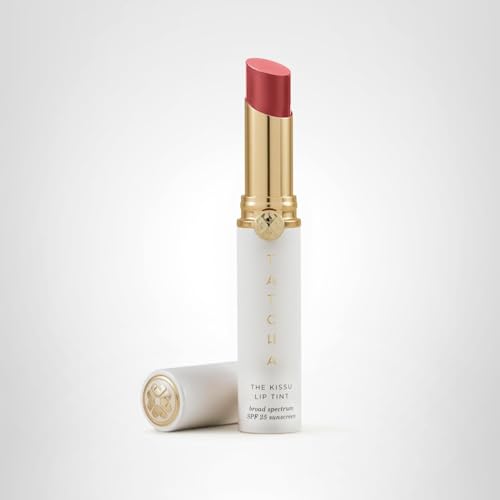 TATCHA Kissu Lip Tint Plum Blossom on model lips conveying natural, radiant color.