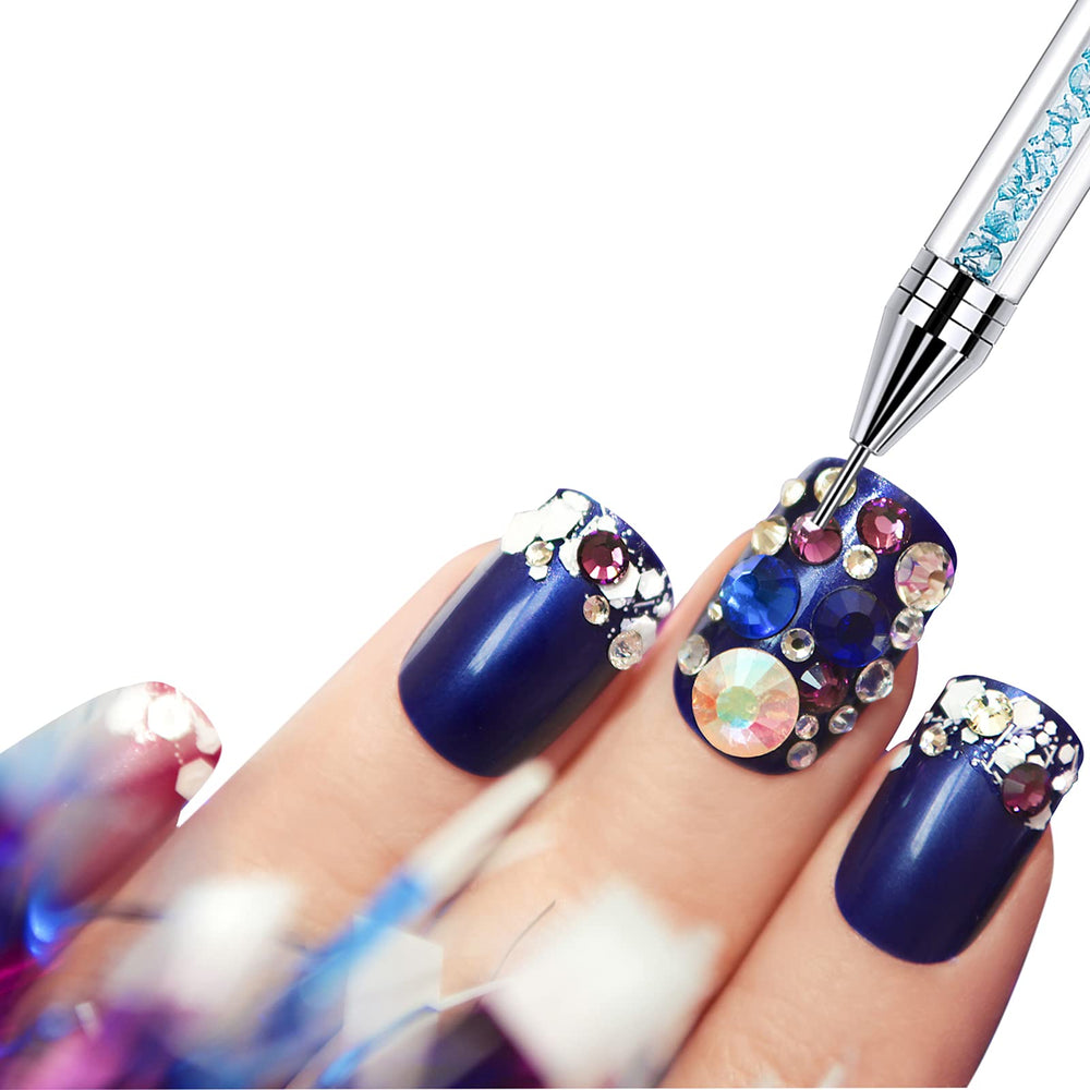 Tatuo rhinestone picker pen for accurate placement on natural or artificial nails.