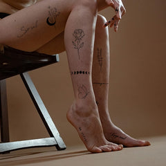 TATUWST branch flower tattoos provide delicate accents for arms, legs, or shoulders.
