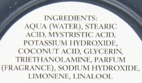 Taylor of Old Bond Street Eton College cream lather forming compact cushion for smooth razor glide.