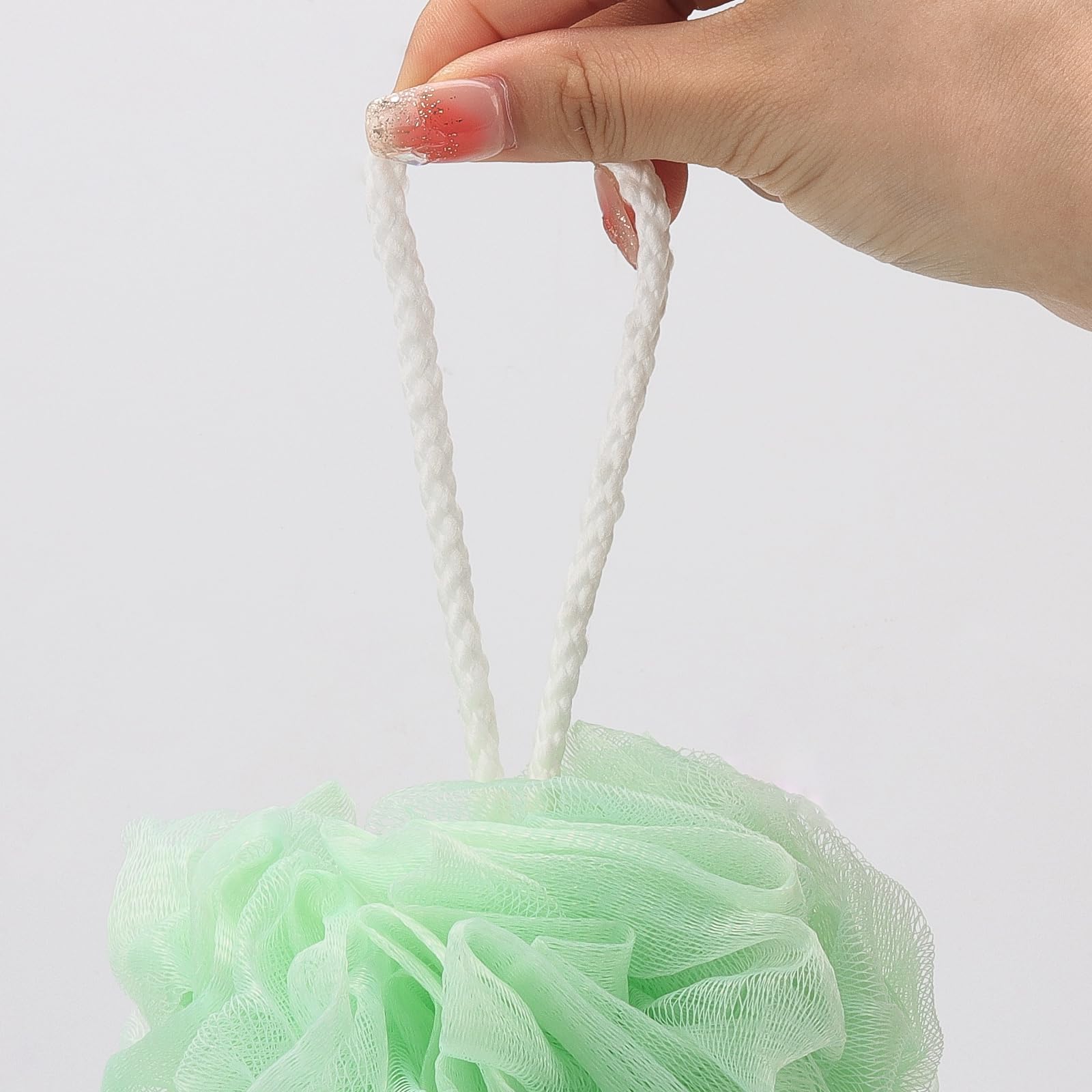 Tbestmax mesh pouf green close-up highlighting skin-smoothing texture