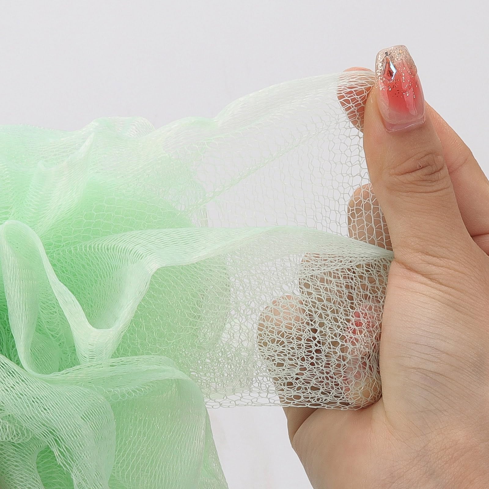 Tbestmax mesh pouf white close-up ready for daily cleansing routine