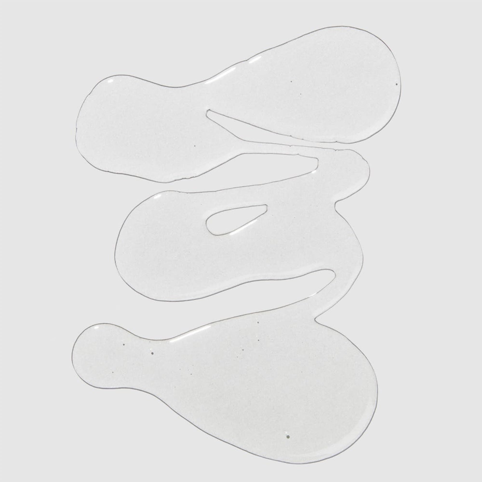 Tea Tree defining gel texture swatch reveals lightweight hold for defined curls.
