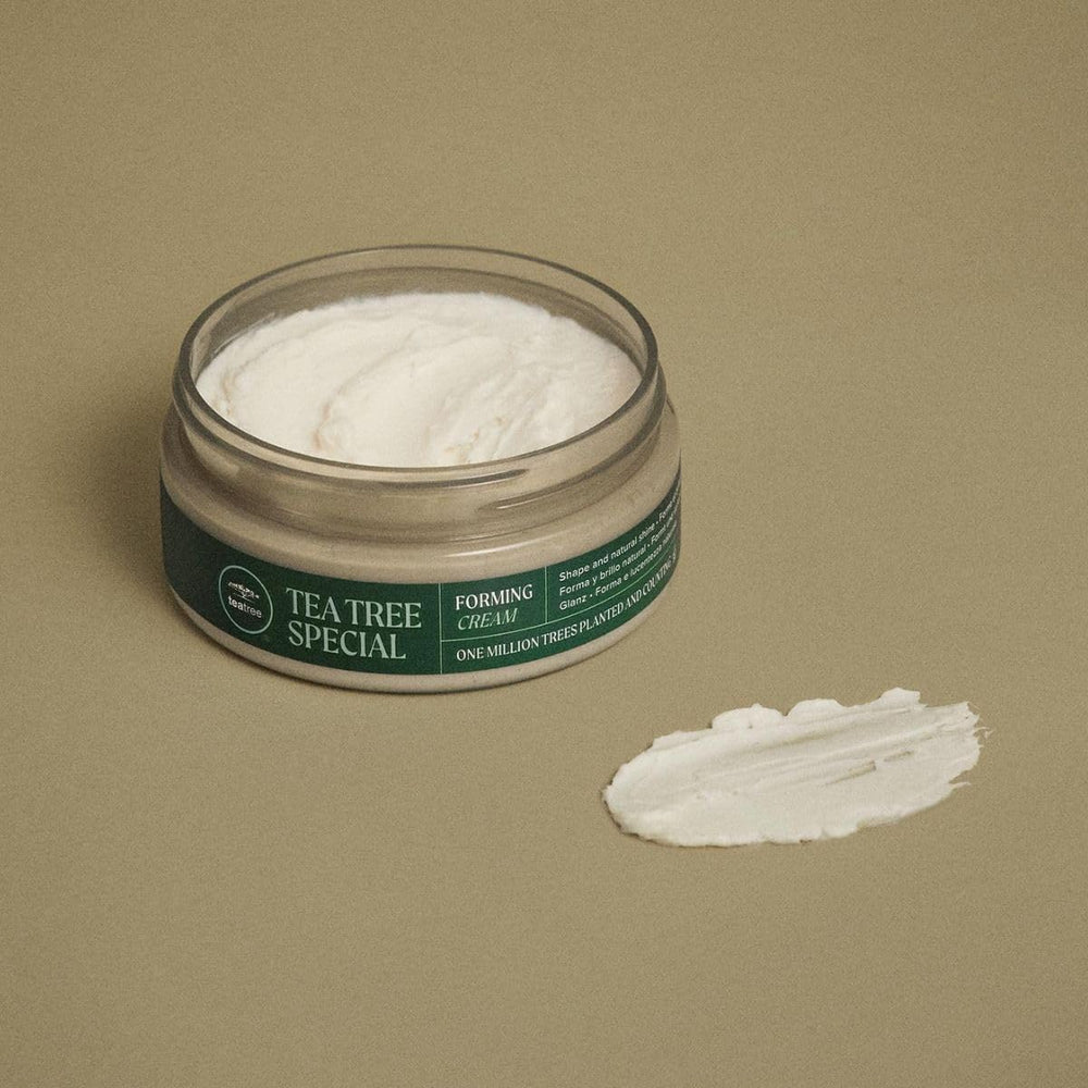 Tea Tree Forming Cream on damp hair boosts fullness with a no-sticky feel.