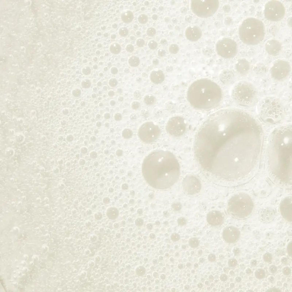 Tea Tree Hemp Restoring Shampoo skin-barrier closeup illustrates hydrating formula for skin comfort.