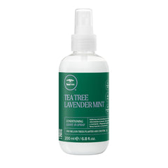 Tea Tree Lavender Mint Conditioning Leave-In Spray bottle demonstrates hydrating formula for soft hair.