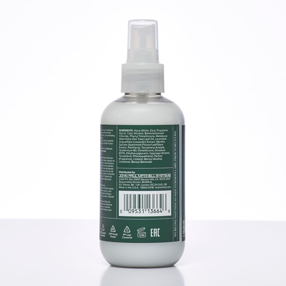 Tea Tree Lavender Mint Leave-In Spray in action to tame dry, unruly strands.