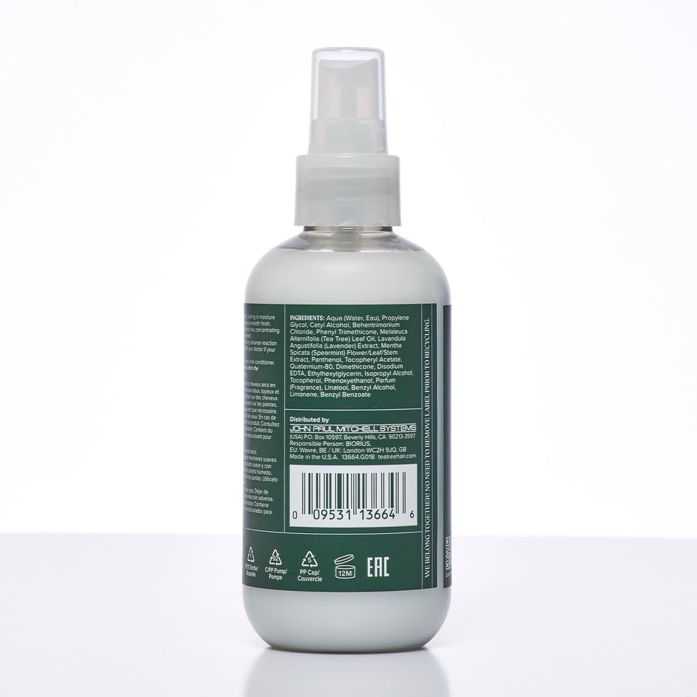 Tea Tree Lavender Mint Leave-In Spray in action to tame dry, unruly strands.