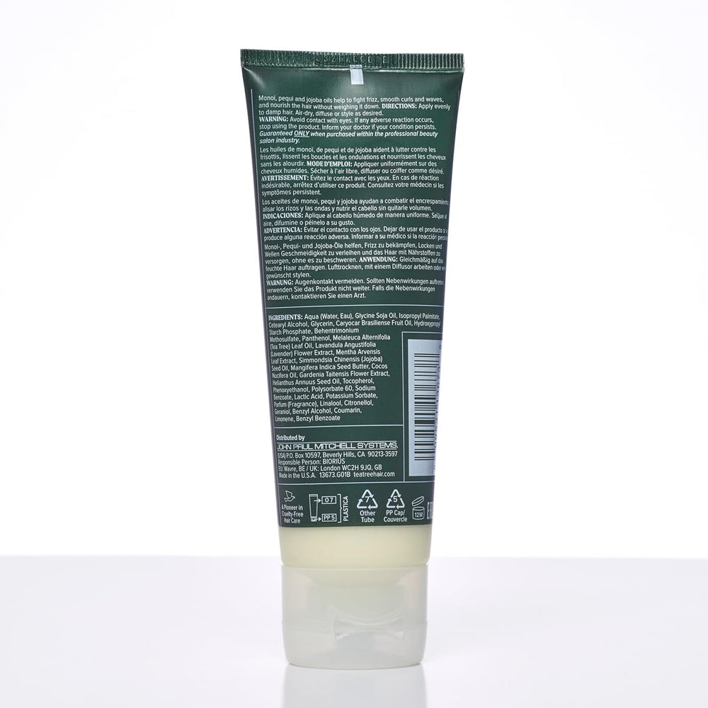 Tea Tree Lavender Mint Taming Cream smooths curls for a polished blowout