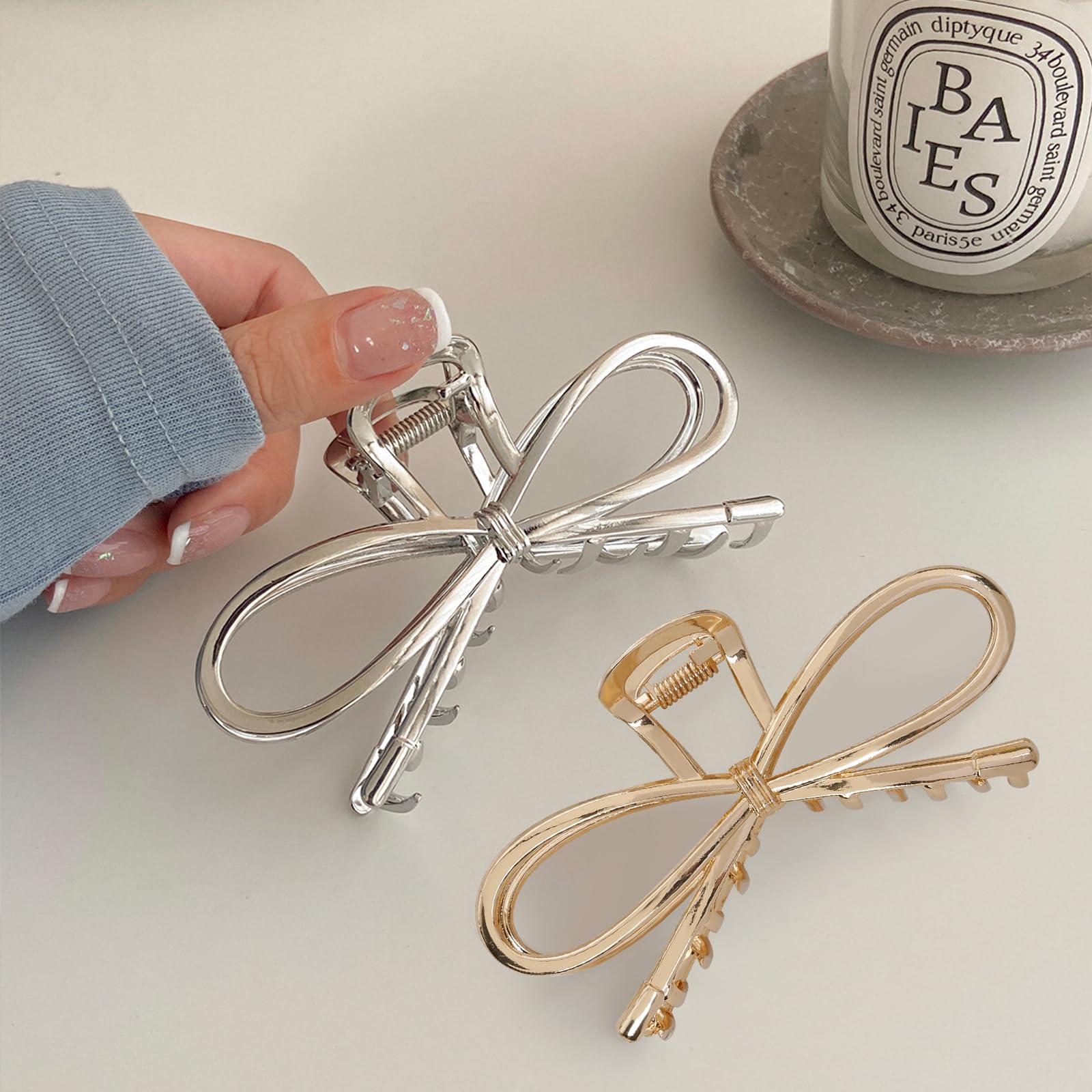 TEBIEKOY bow clips silver closeup shows classic shine and compatibility with outfits