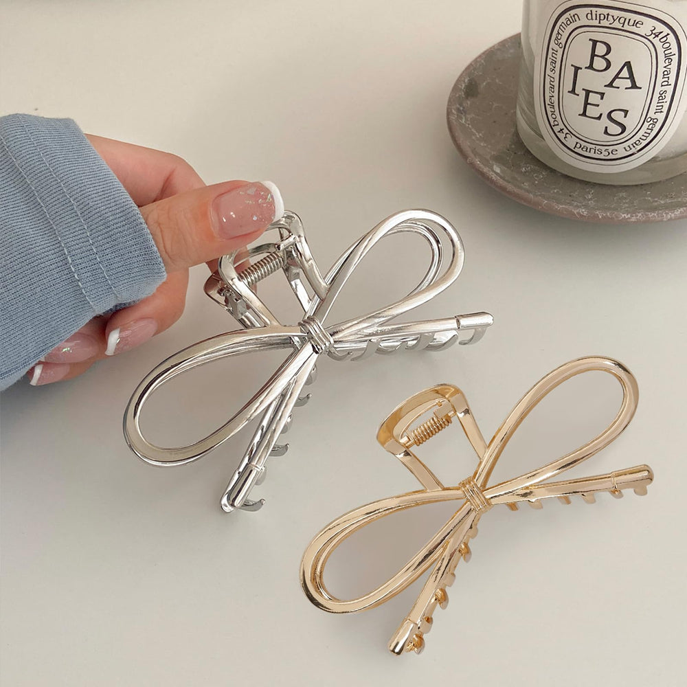 TEBIEKOY bow clips silver closeup shows classic shine and compatibility with outfits