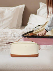 Telena Leather Make Up Bag wide-opening design for quick access to cosmetics.