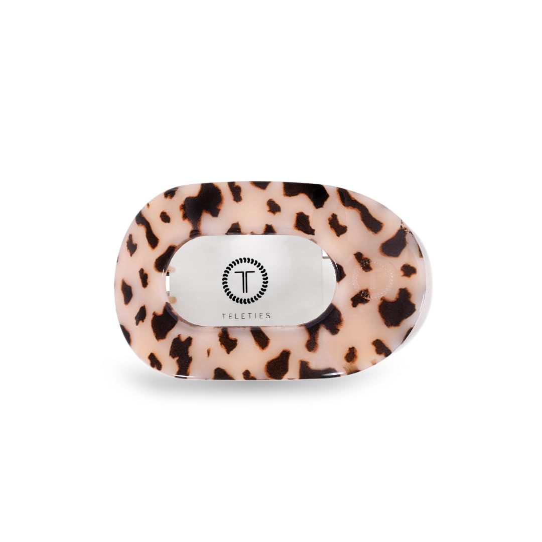 Teleties large flat round clip demonstrates strong grip for thick hair.