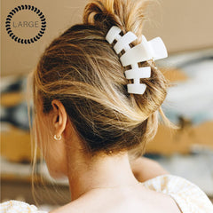 Teleties coconut white clip on a ponytail demonstrates comfortable curved design for all-day wear.