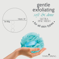 Temple Spring Recycled Luffa Sponge Ocean Blue handheld view illustrates ergonomic grip for easy showering.