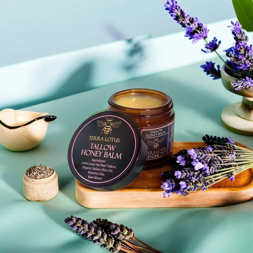Terra Lotus grass-fed beef tallow ingredients with olive oil and honey visible, nourishing skin.