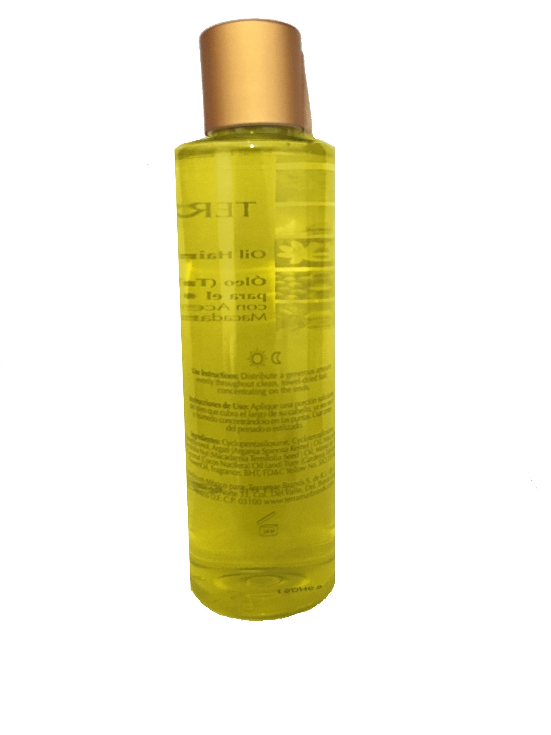 Terramar Oleo applying on hair ends to seal moisture.