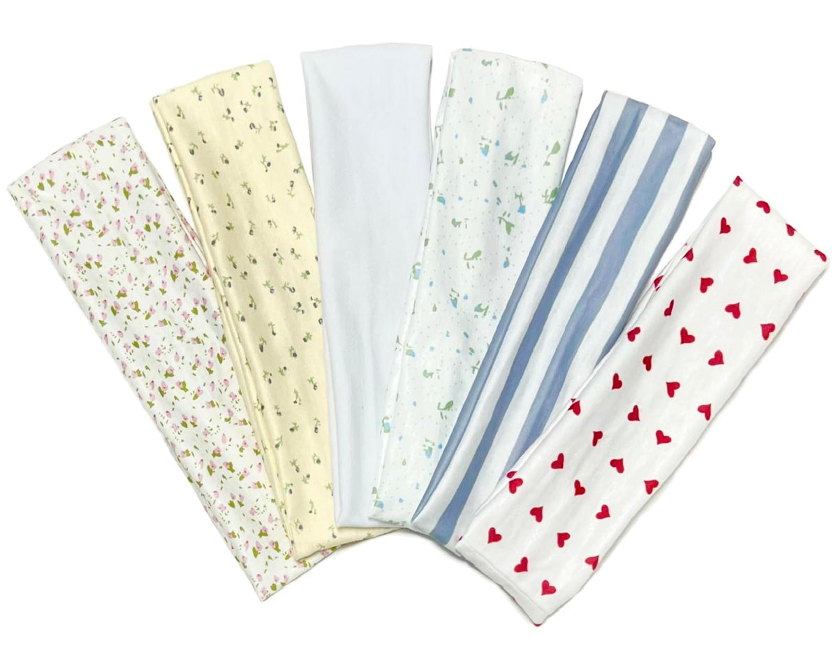 TERSE headband with floral pattern demonstrates secure non-slip wear during workouts.