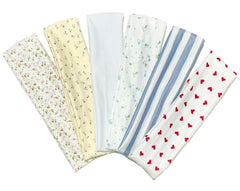 TERSE headband with floral pattern demonstrates secure non-slip wear during workouts.