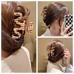Textention 2-pack packaging with two clips and hair tie for versatile styling