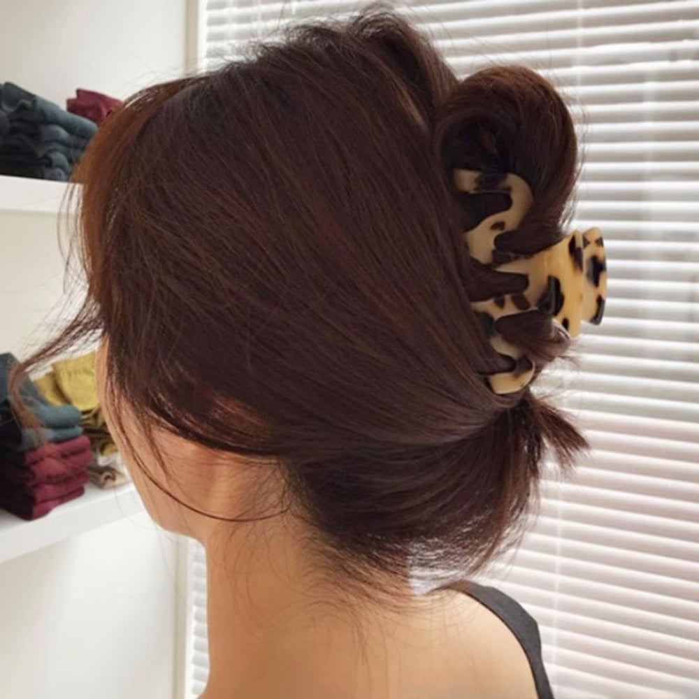 Textention large claw clip in desk-friendly home or office hairstyle