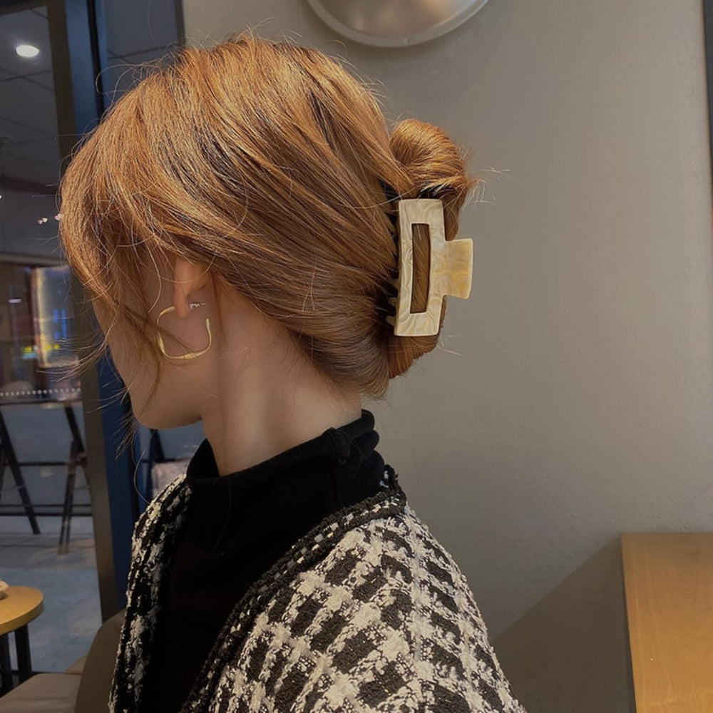 Textention thick-thin friendly clip suitable for straight or curly hair.