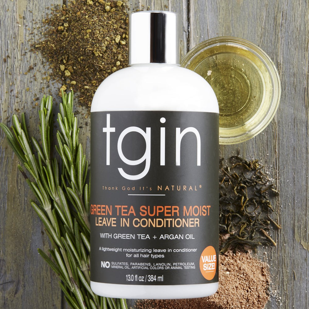 tgin Green Tea Super Moist Leave In pump demonstrates frizz control during styling