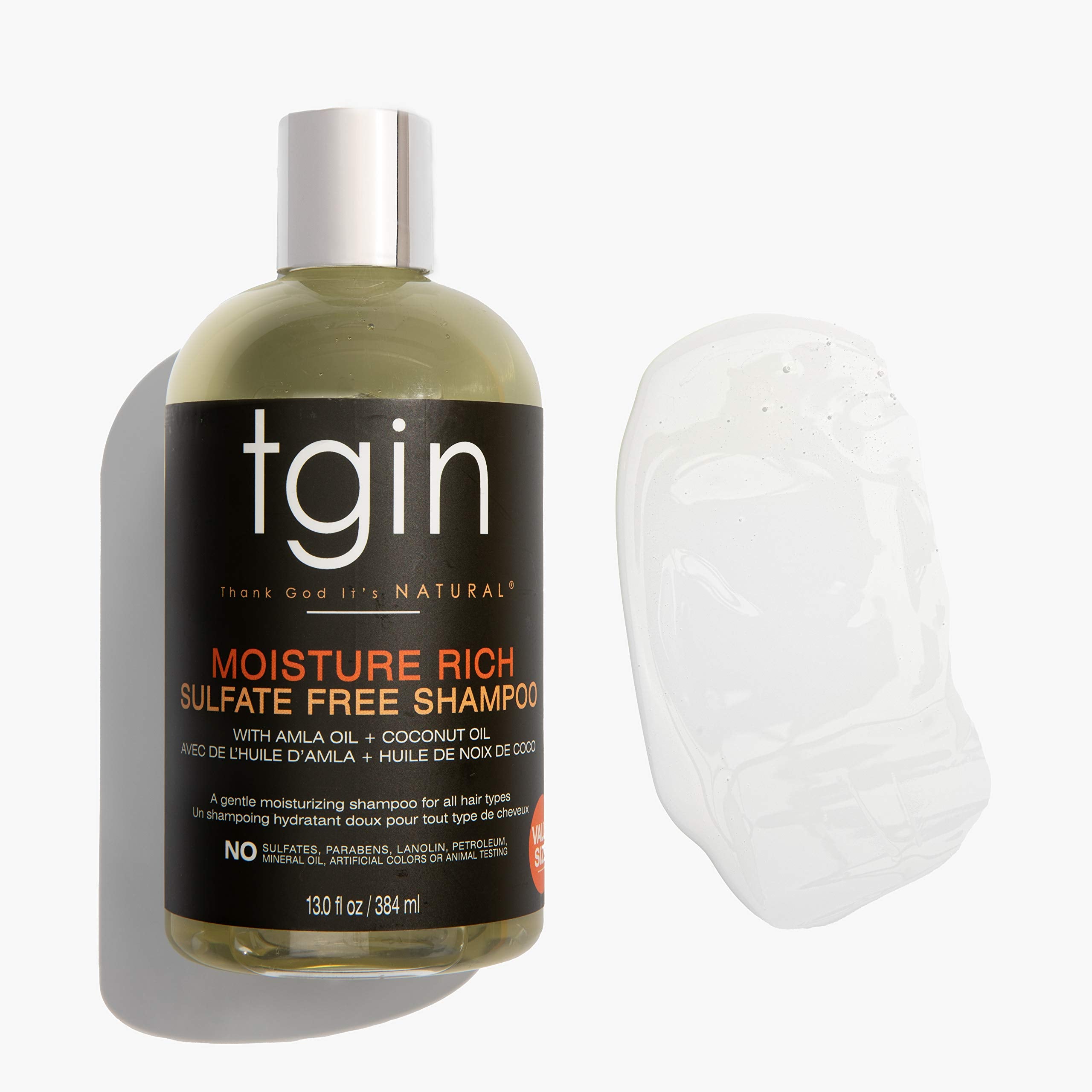 tgin Moisture Rich Shampoo rinsing-hair image hints at soft smooth results after wash