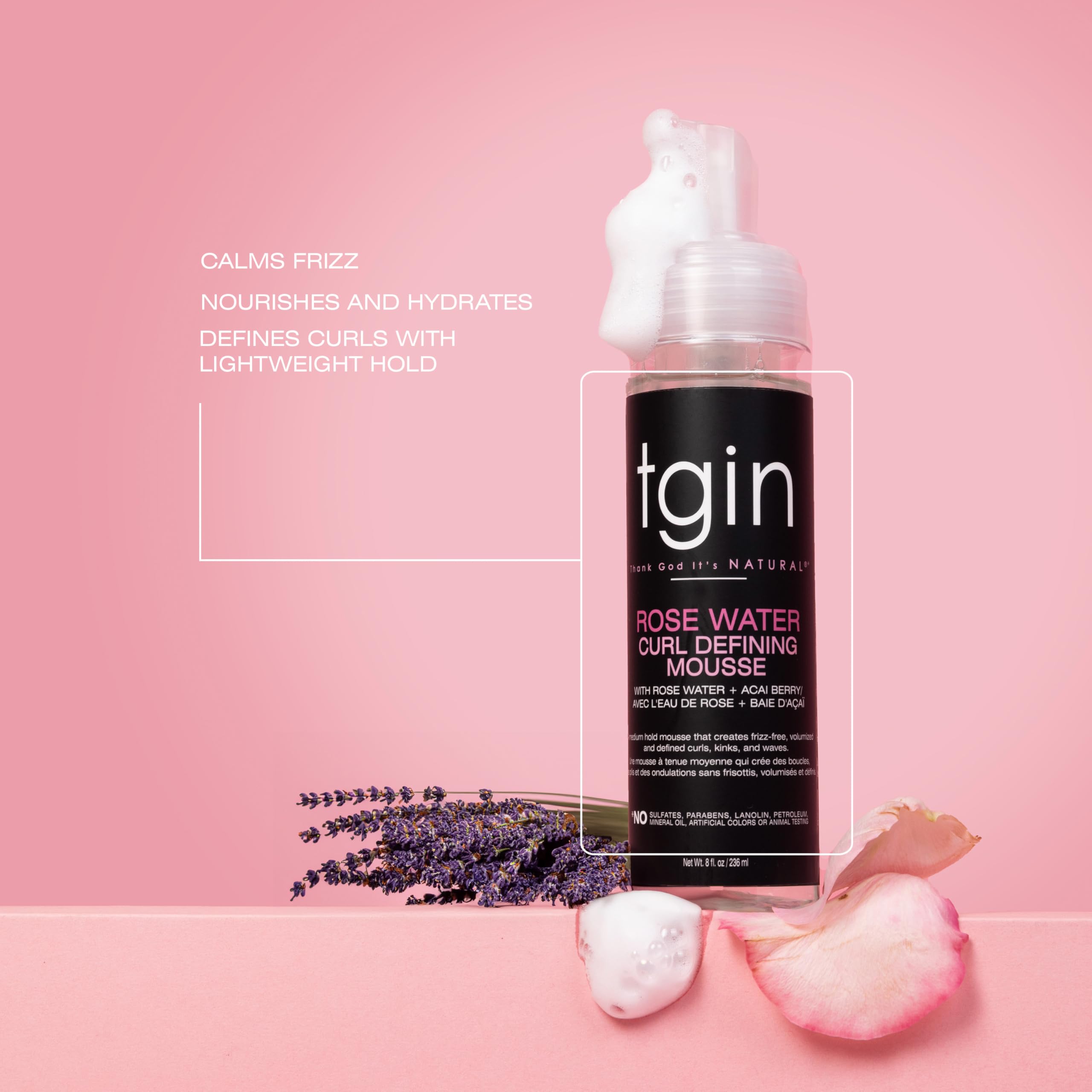 tgin Rose Water Defining Mousse being applied to curly hair for defined definition