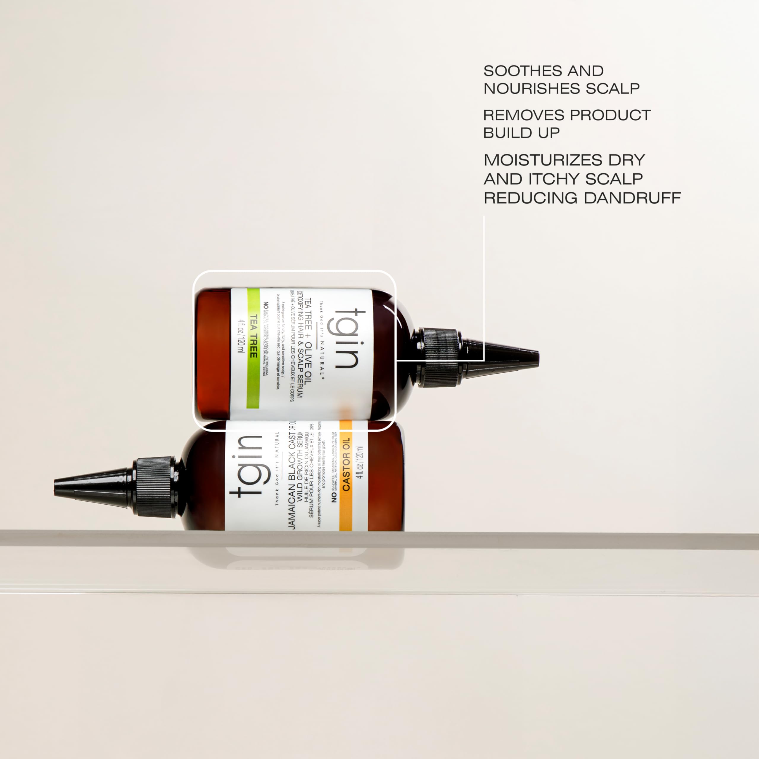 tgin Tea Tree Olive Oil Serum applied to the scalp showing soothing hydration