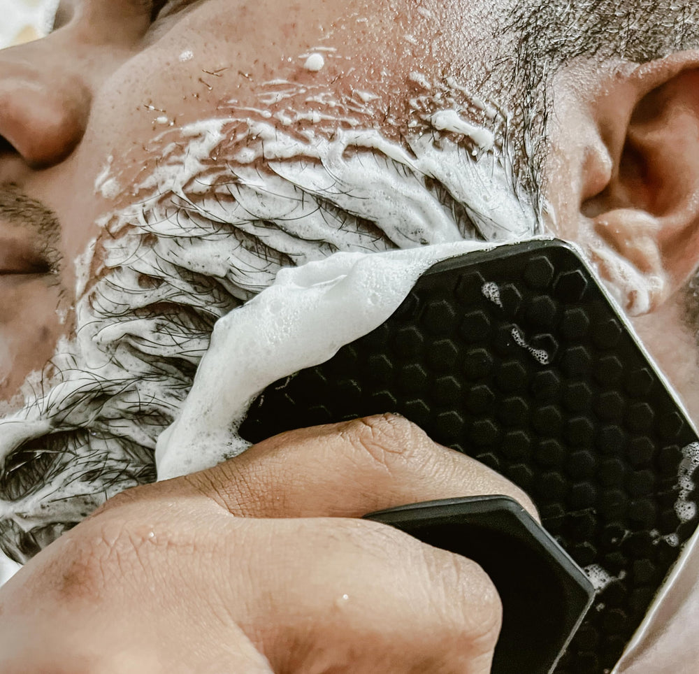 The BEARD BLACK scrubber grip-handle provides secure grip during cleansing.