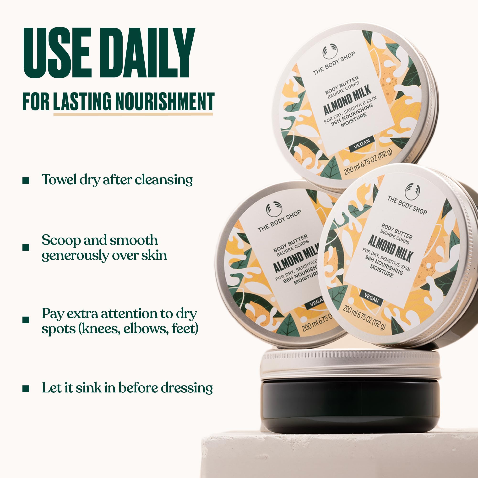 The Body Shop almond milk body butter glows with creamy texture and comforting fragrance.