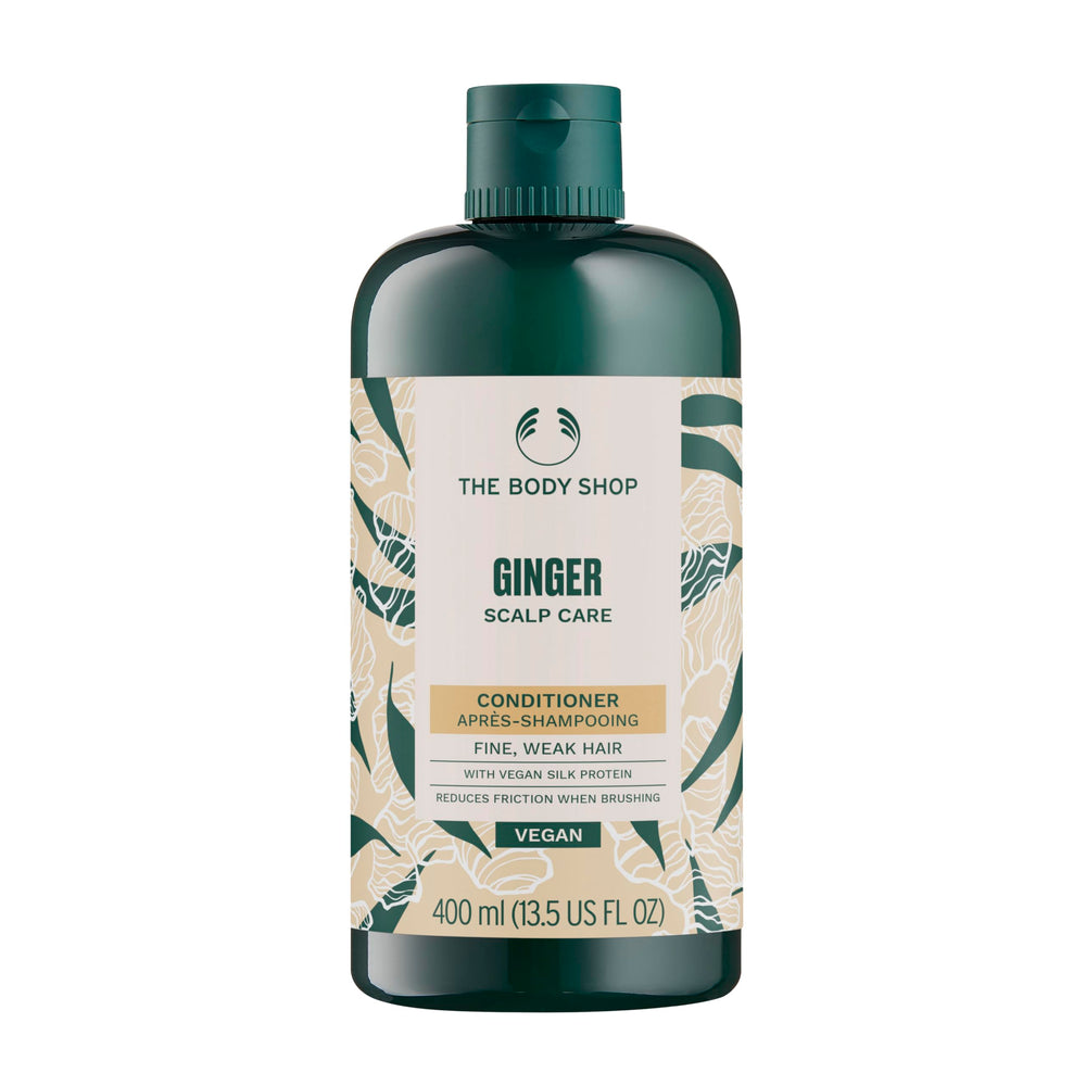 The Body Shop Ginger Scalp Care Conditioner bottle close-up, smoother detangling for fine hair