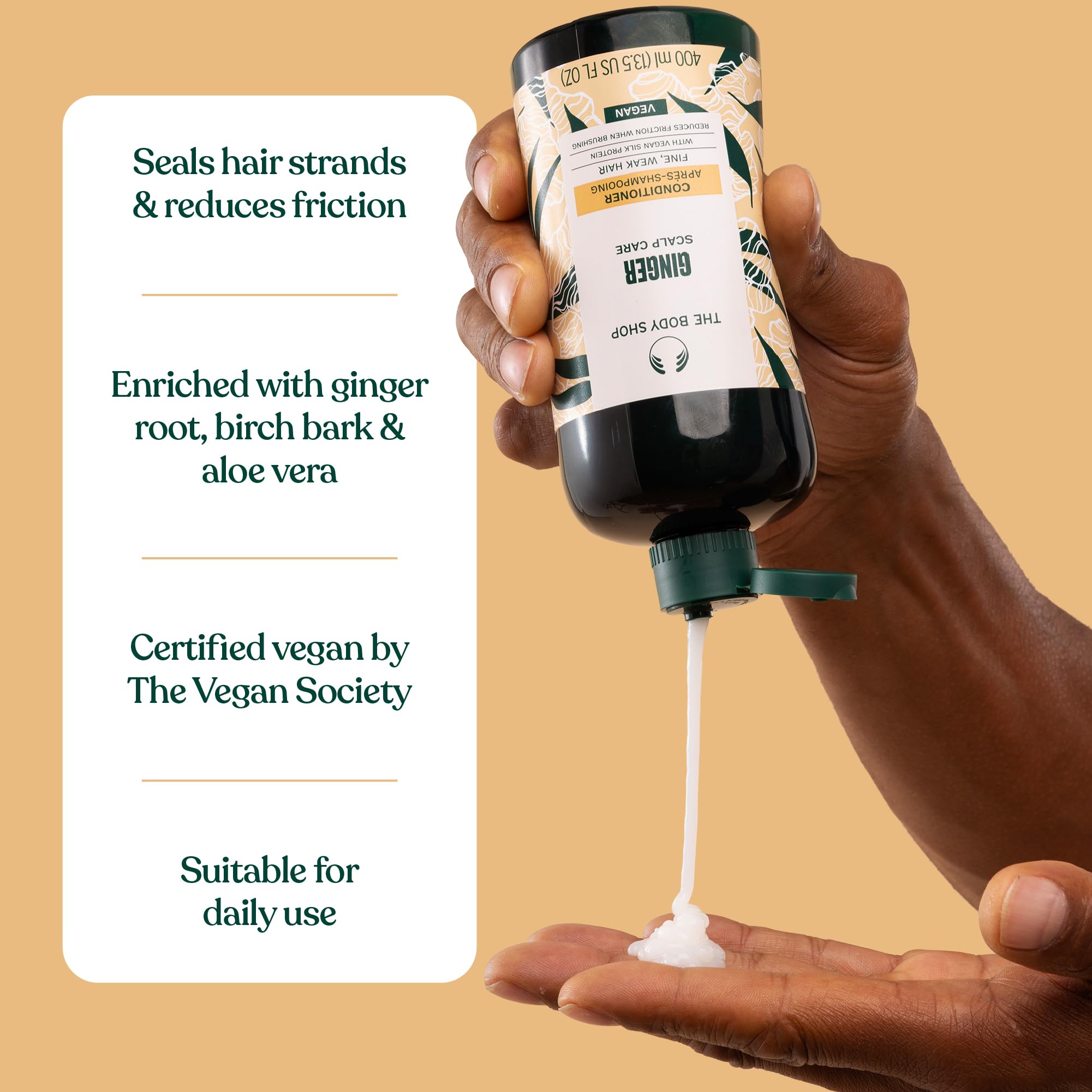 The Body Shop Ginger Scalp Care Conditioner bottle label highlights natural extracts and ethical sourcing.