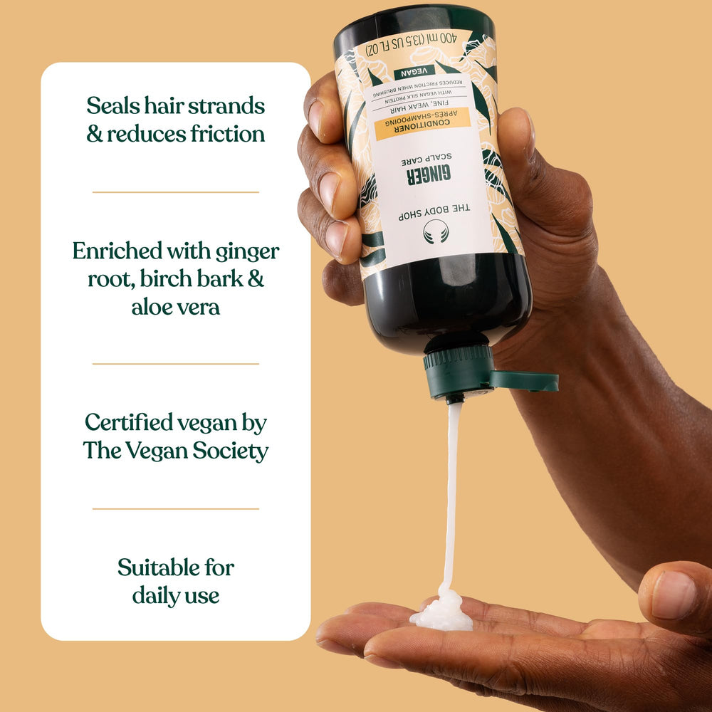 The Body Shop Ginger Scalp Care Conditioner bottle label highlights natural extracts and ethical sourcing.