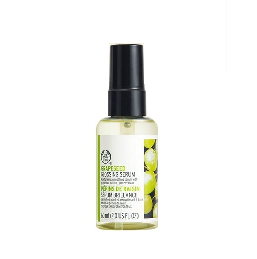 The Body Shop Grapeseed Glossing Serum clear bottle provides a glossy shine for dull hair