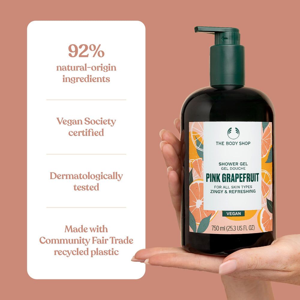 Close-up of The Body Shop Pink Grapefruit Shower Gel labeling, cruelty-free promise visible.