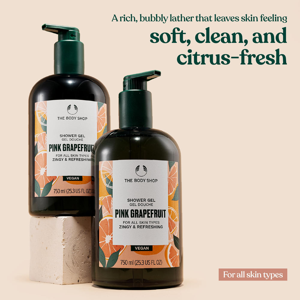 A pump dispense of The Body Shop Pink Grapefruit Shower Gel delivering rich foam.