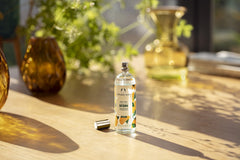 The Body Shop Satsuma Body Mist packaging in recycled glass supports planet-friendly spritzing.