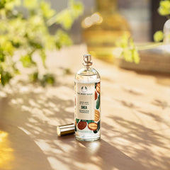 The Body Shop Shea Body Mist in use on skin for quick absorption and scent