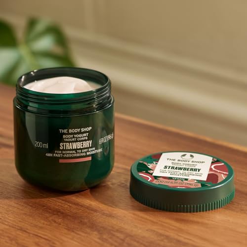 The Body Shop Strawberry Body Yogurt strawberry-juice detail hints at natural fruit extract benefits.